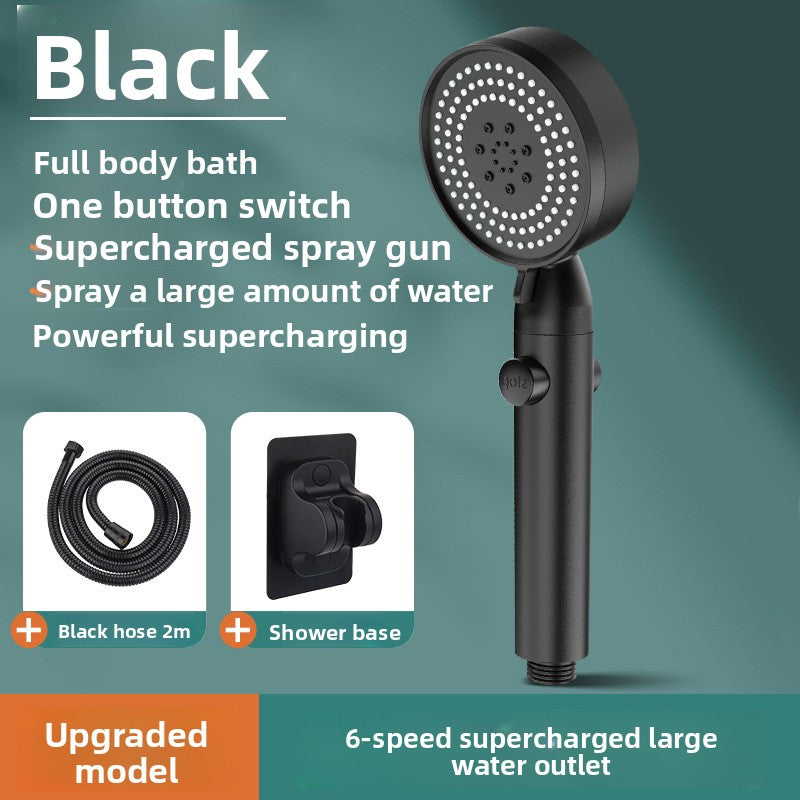 Black handheld shower head with tube and shower base