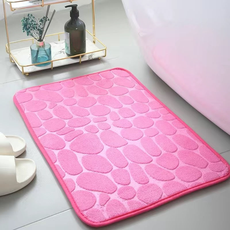 Dark Pink textured bath mat on a bathroom floor