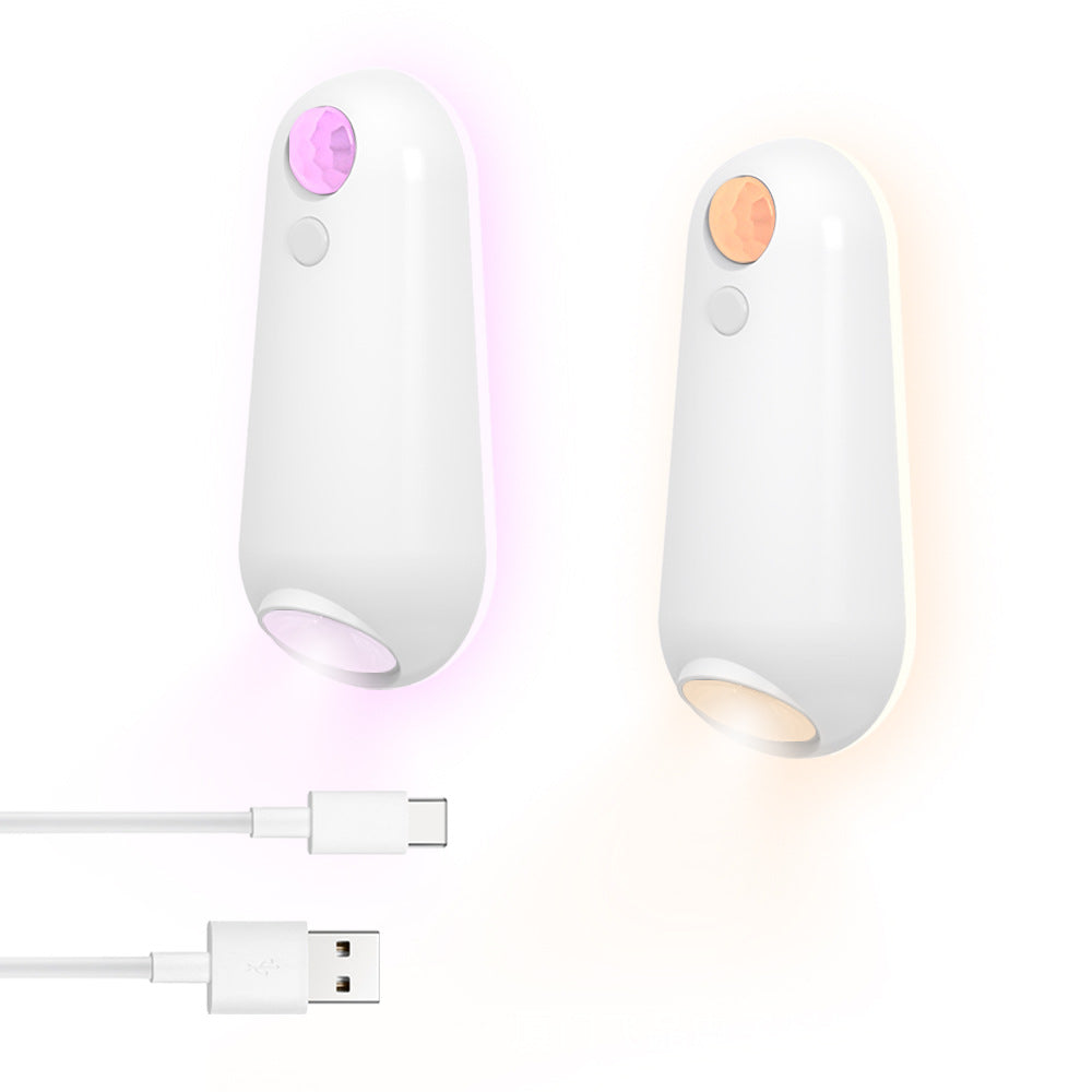 Two white handheld devices with colorful lights and a USB cable on a white background